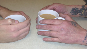 Hands Holding Drinks